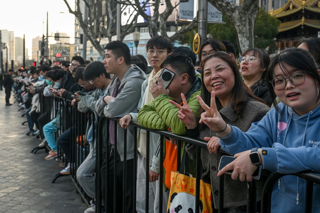 Customers lined up sometimes for days outside of Shanghai's new Apple retail store before its grand opening