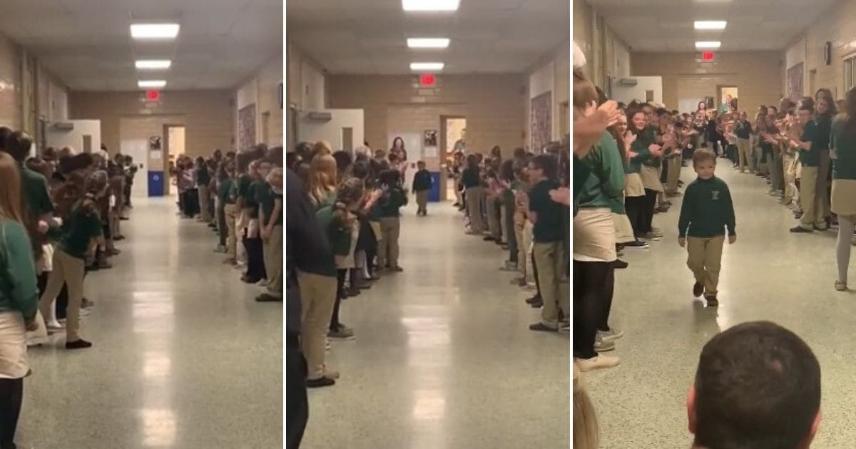 Video shows heart-warming moment class gives boy standing ovation after beating cancer