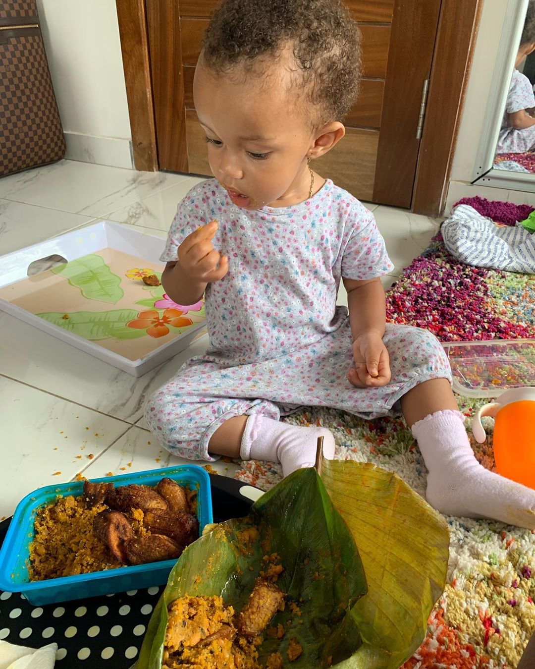 Yvonne Nelson's daughter Ryn spotted eating beans and gari (Photo)