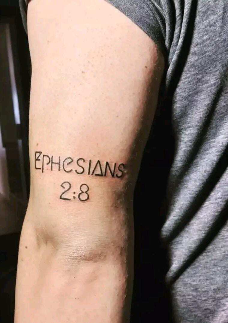 20 of the best religious tattoos for men that will make you look cool - YEN.COM.GH