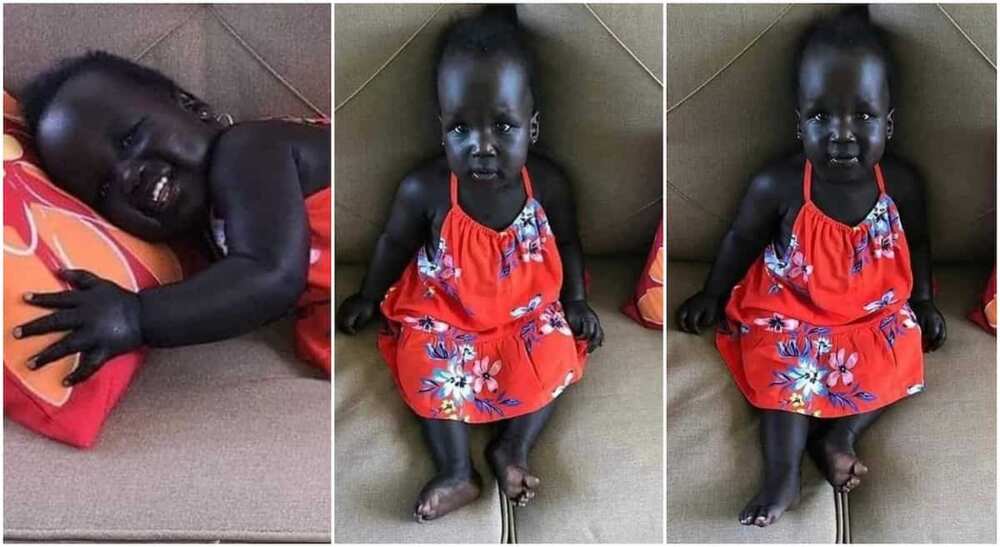 Little girl with shinning black skin.