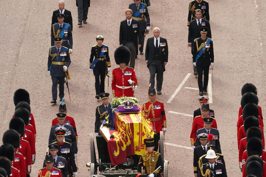 King Charles III led the royal family in procession behind a horse-drawn gun carriage bearing the casket