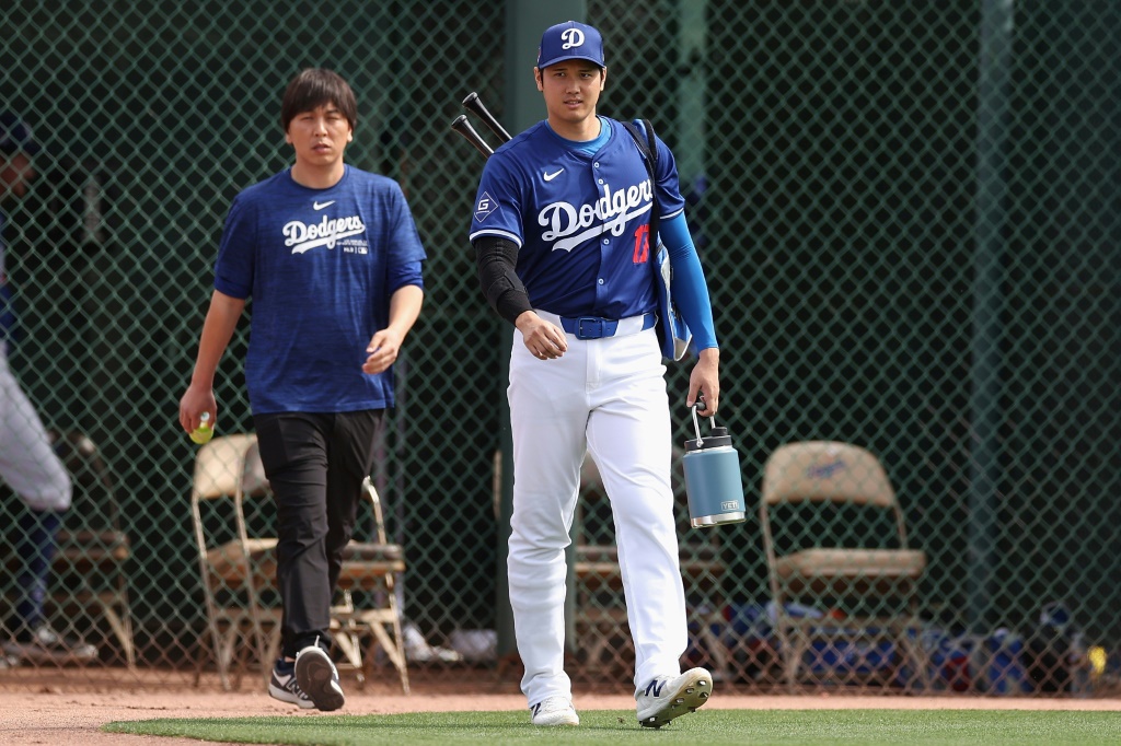 Shohei Ohtani (right) and former interpreter Ippei Mizuhara, who is accused of stealing more than $16 million from the Japanese baseball star