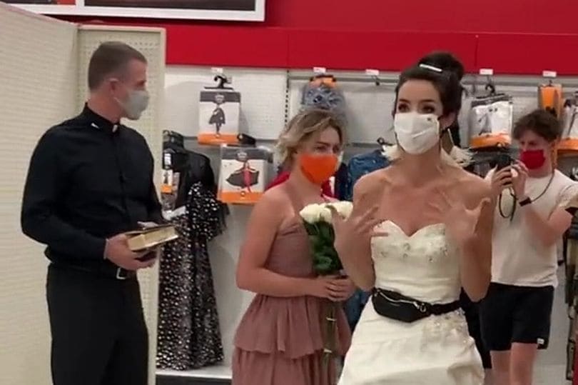 Woman shows up to fiance's workplace in wedding dress, demands to be married