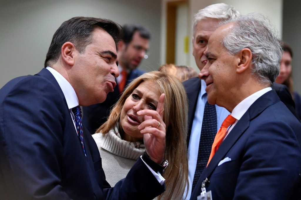EU vice-president Margaritis Schinas (left) warned interior ministers like Italy's Matteo Piantedosi that the time for ad hoc solutions to migrant arrivals is over