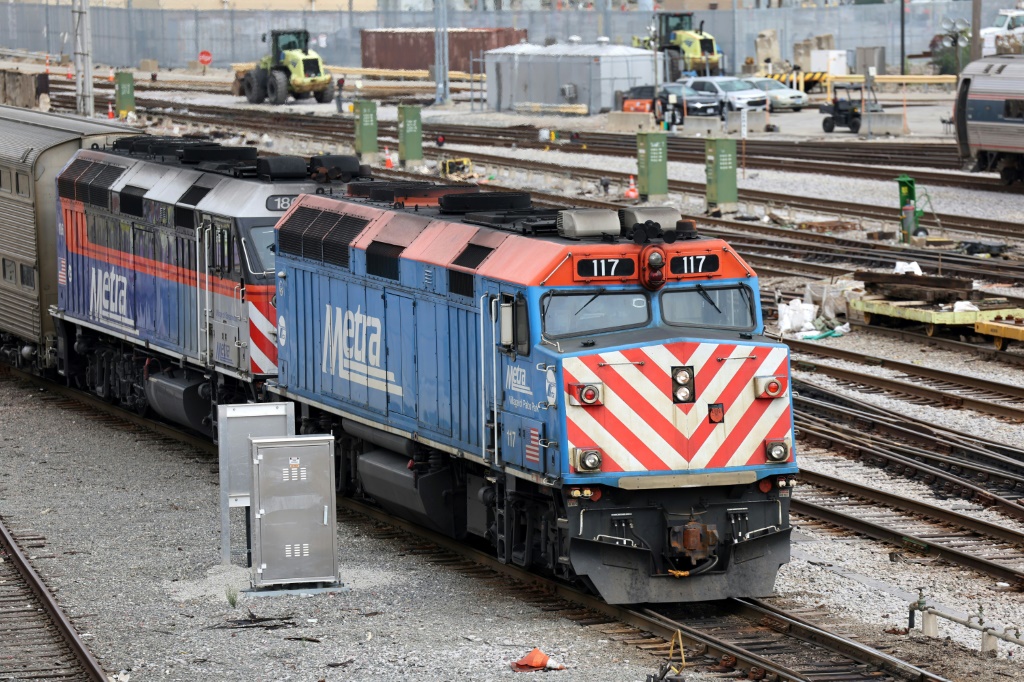 A Metra commuter train rolls out of downtown Chicago, Illinois