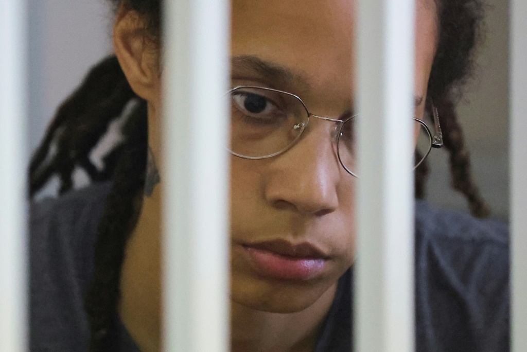 Basketball star Brittney Griner inside a defendants' cage during a hearing in Khimki outside Moscow in August 2022