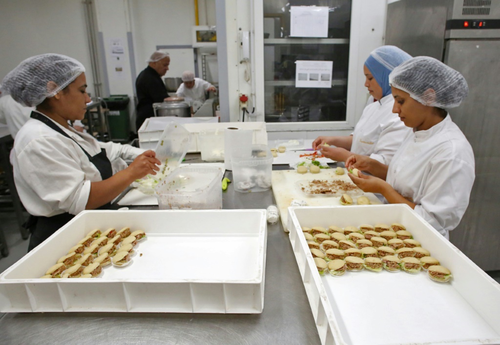 Employees of the Tunisian patisserie chain Gourmandise