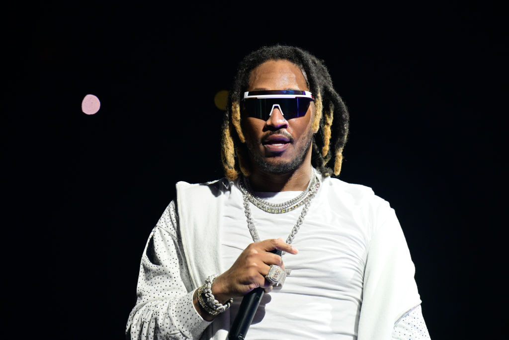 Future performs in a white tee and hood in Sunrise, Florida.