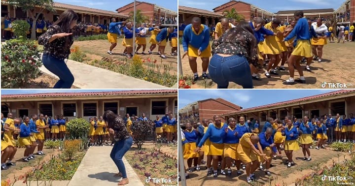 Teacher dances with students