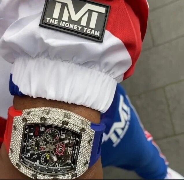 Floyd Mayweather: Boxing legend flaunts £200k diamond-encrusted watch during UK trip