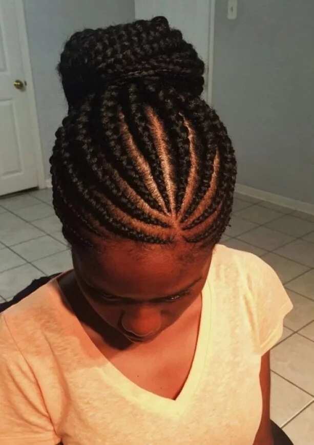 Cornrow braids in a high bun