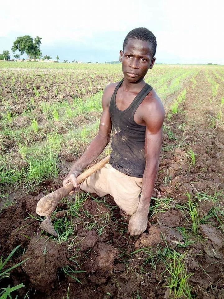 Meet Gaddafi a disabled man who farms to make a living for himself (photo)